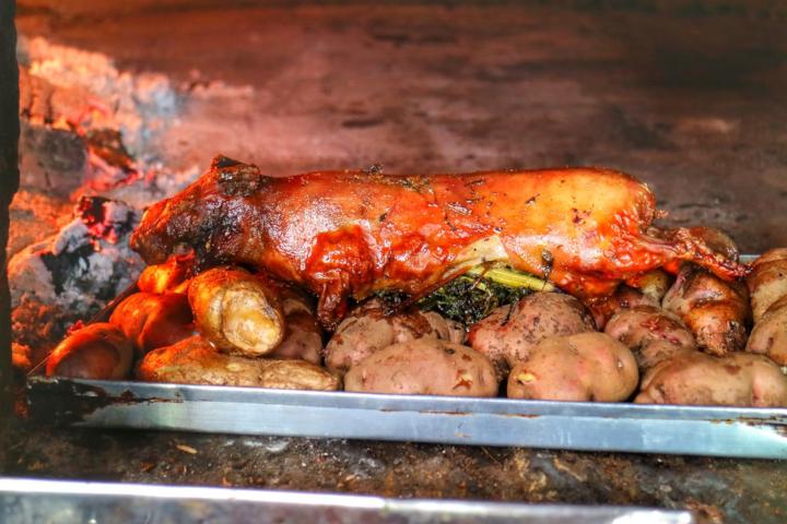 Eating Guinea Pig (Cuy) in Peru