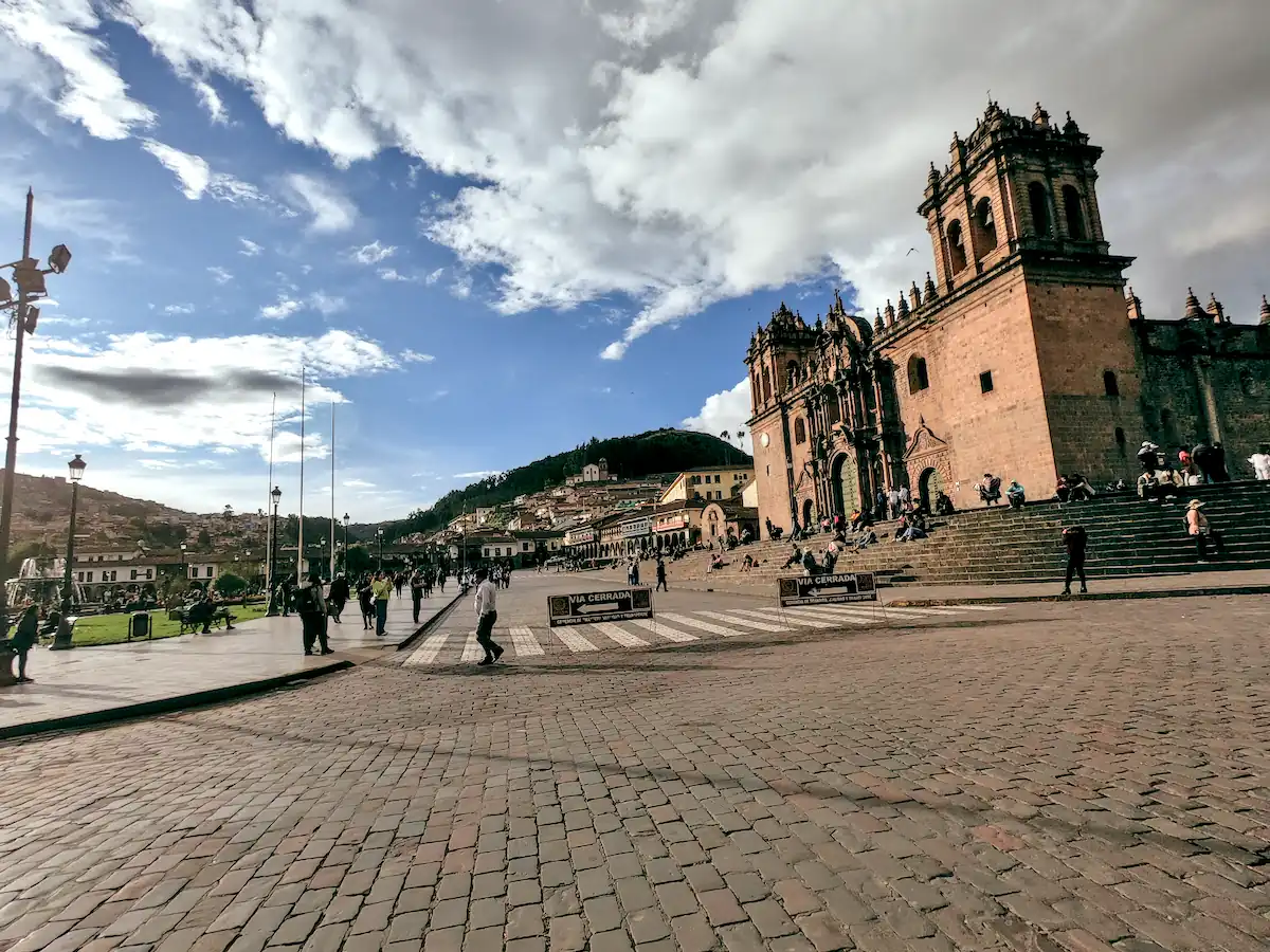 Cusco Cathedral And Plaza De Armas From The Cobblestone Main Square