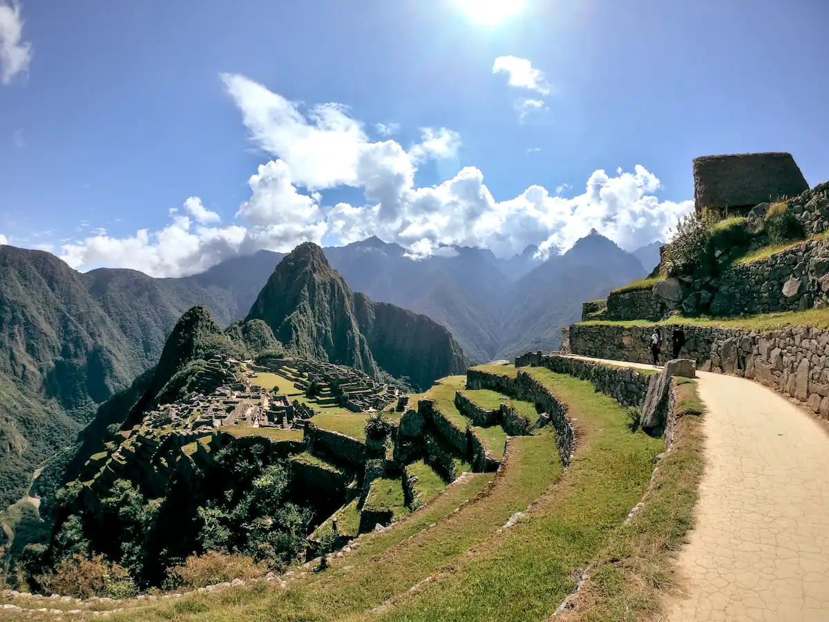 High Angle View Of Machu Picchu Ruins, Agricultural Terraces, And Huayna Picchu Mountain